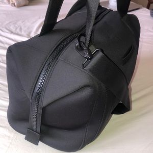 Dagne Dover Medium Landon Neoprene duffle bag